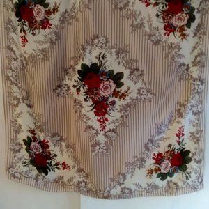 Club 7: Beautiful silk scarf with vibrant floral print.